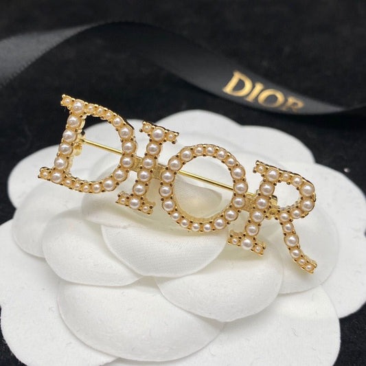 Dior brooch
